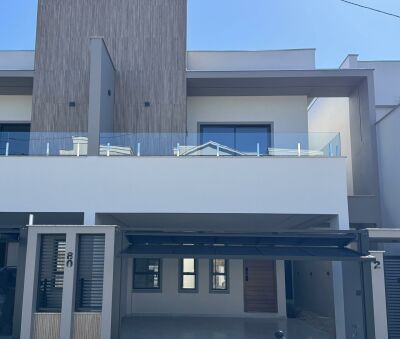 Imagem principal de Casa geminada alto padrão com piscina e 03 suítes no Bairro Amizade loading=